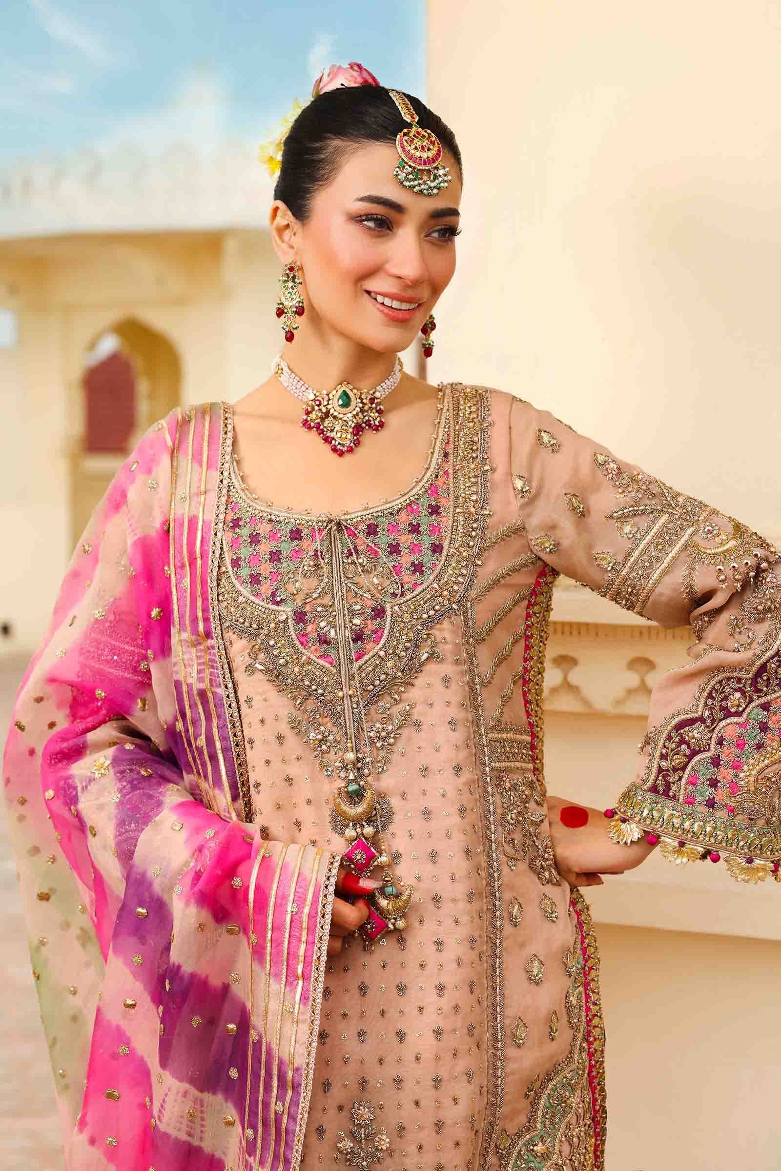 Faiza Saqlain Zeena Embroidered Organza Party Wear Suit – Back View & Silhouette Faiza Saqlain Zeena Embroidered Organza Party Wear Suit - Embroidered Back & Daman Silhouette Detailing | IQNAZ