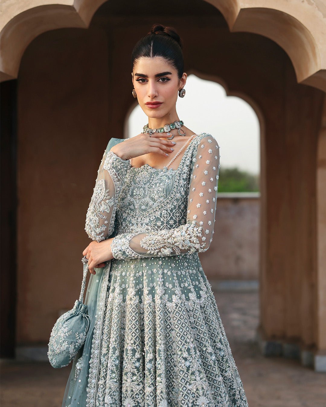 Faiza Saqlain Dorien Hand Embellished Net Bridal Lehenga - Close-Up Hand Embellishment Tilla & Pearl Work | IQNAZ