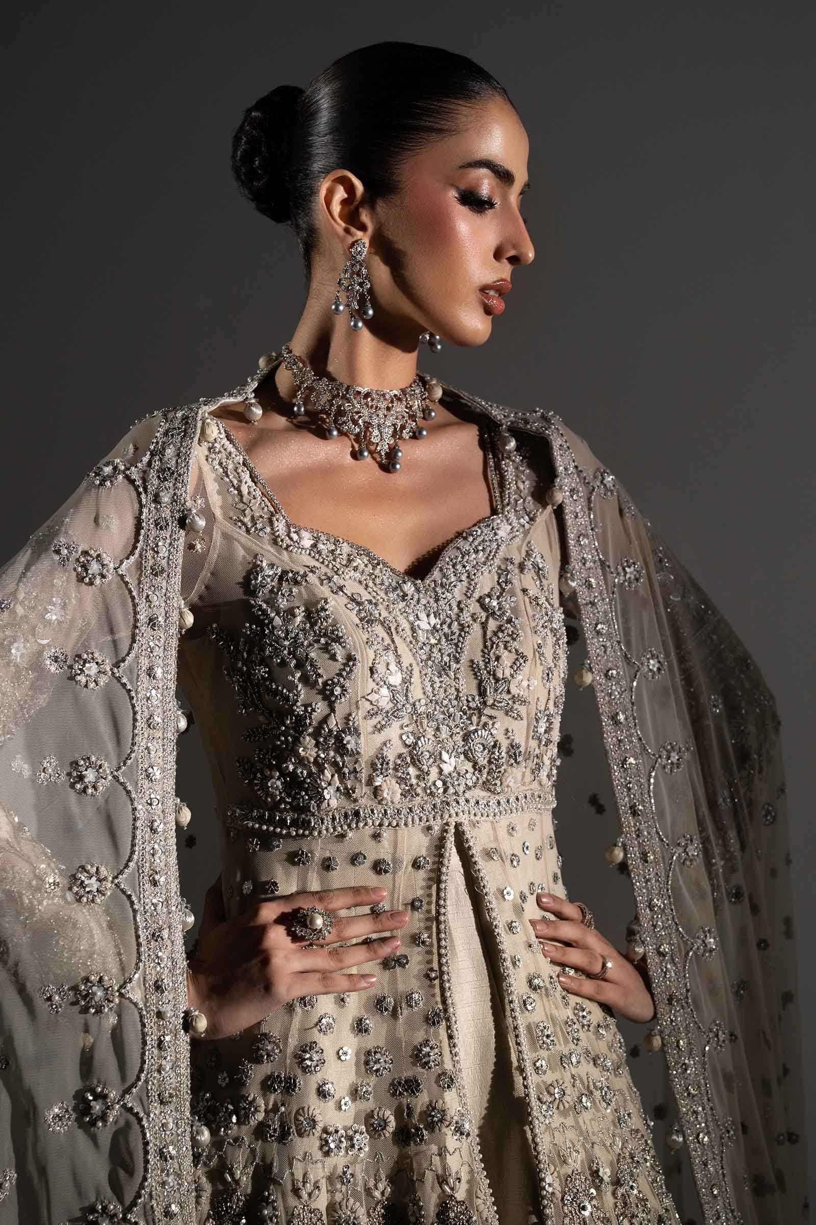 Maria B Elaria Hand Embellished Organza Party Wear Maxi – Back View & Silhouette Maria B Elaria Hand Embellished Organza Party Wear Maxi - Embroidered Back & Daman Silhouette Detailing | IQNAZ
