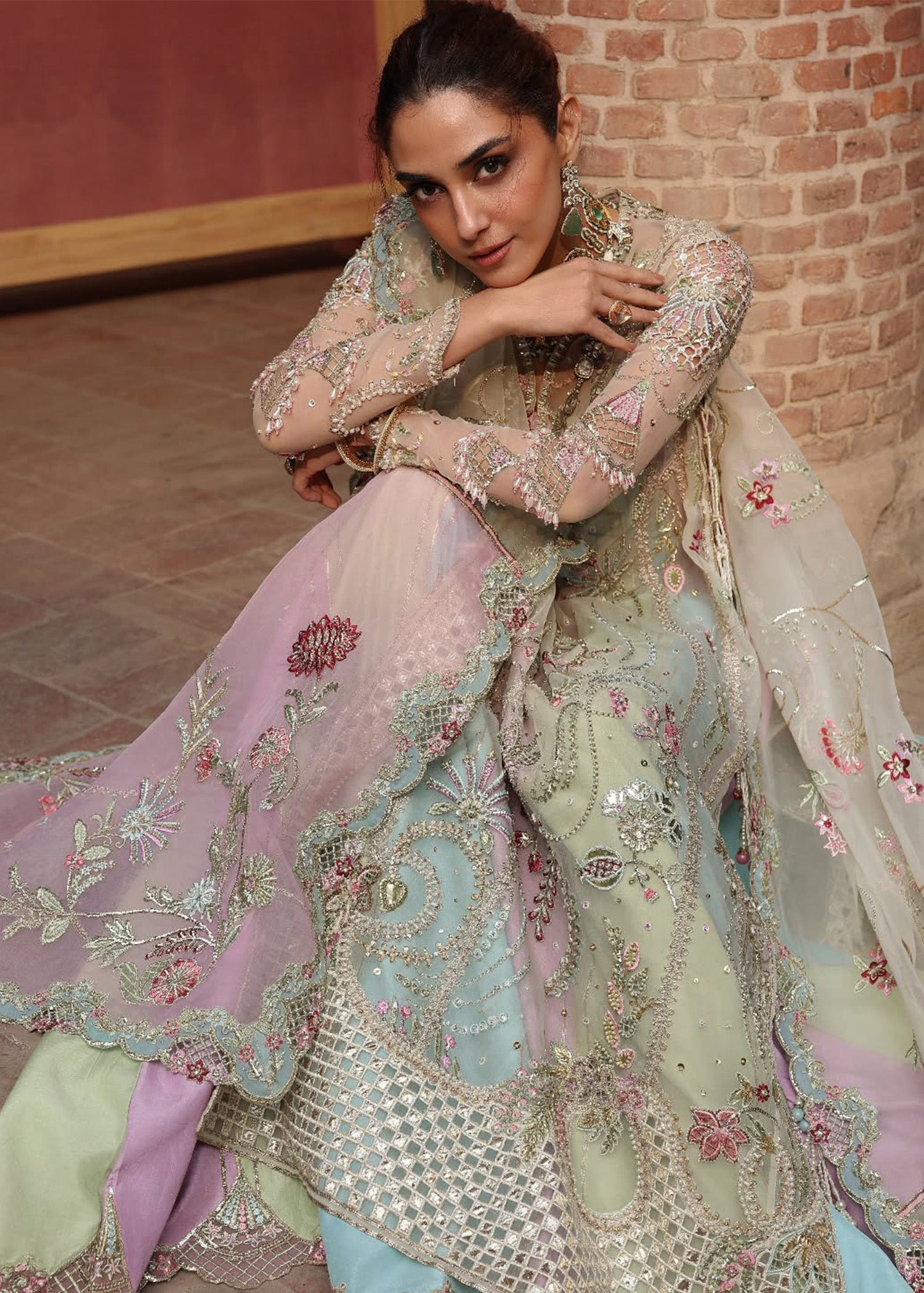 Crimson Rangoli Hand Embellished Raw Silk Bridal Lehenga – Back View & Silhouette Crimson Rangoli Hand Embellished Raw Silk Bridal Lehenga - Embroidered Back & Daman Silhouette Detailing | IQNAZ