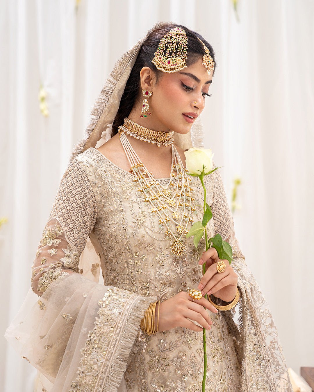 Faiza Saqlain Safak Hand Embellished Net Party Wear Suit – Embroidery & Handwork Detail Faiza Saqlain Safak Hand Embellished Net Party Wear Suit - Close-Up Hand Embellishment Tilla & Pearl Work | IQNAZ