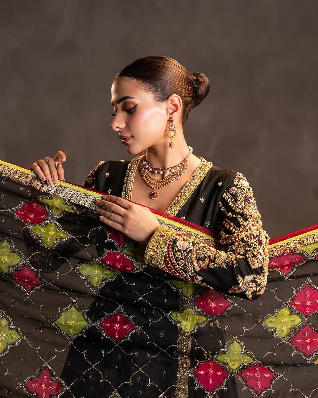 Ahmad Sultan Embroidered Organza Party Wear Suit – Back View & Silhouette Ahmad Sultan Embroidered Organza Party Wear Suit - Embroidered Back & Daman Silhouette Detailing | IQNAZ
