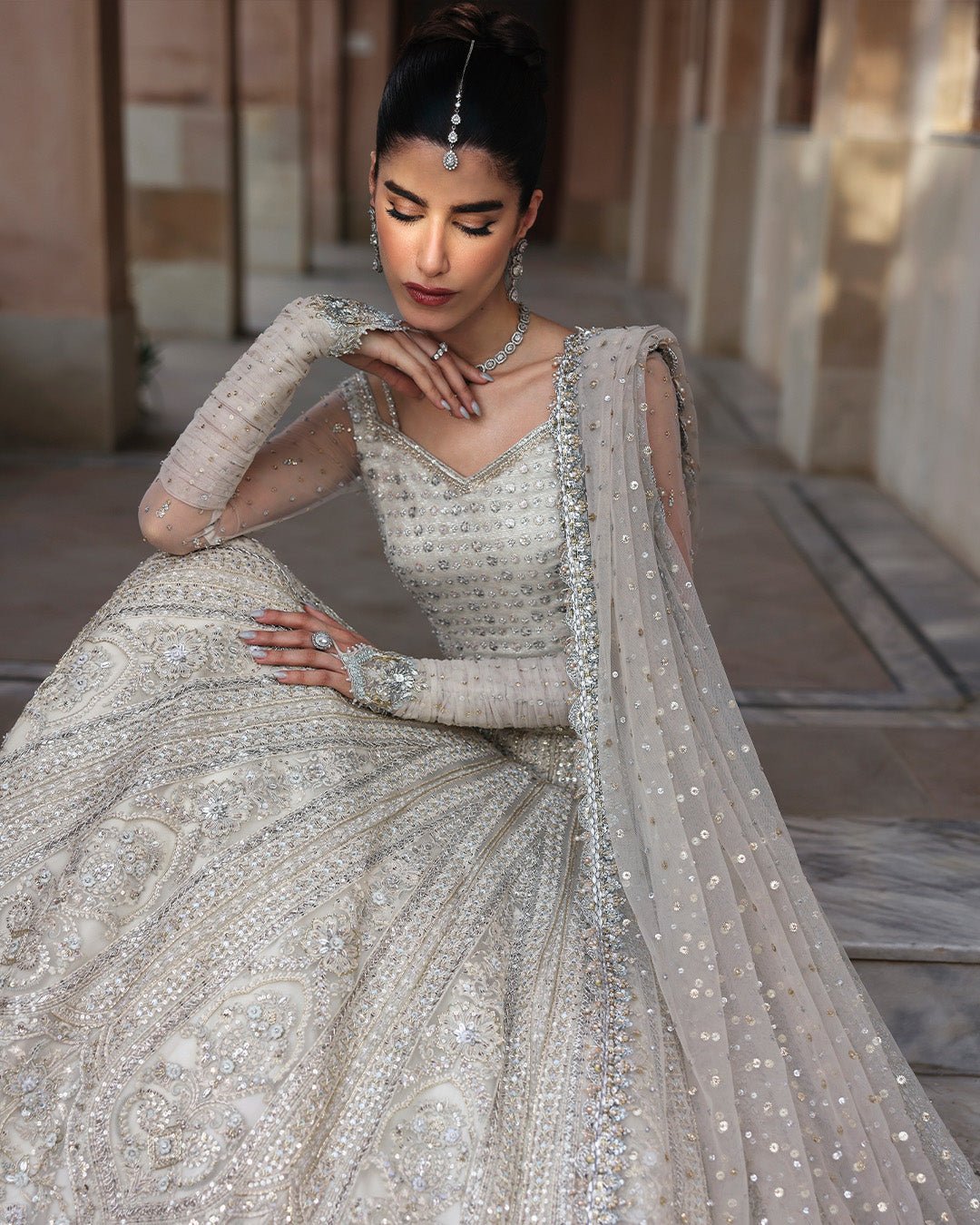 Faiza Saqlain Cammi Hand Embellished Net Bridal Maxi – Back View & Silhouette Faiza Saqlain Cammi Hand Embellished Net Bridal Maxi - Embroidered Back & Daman Silhouette Detailing | IQNAZ