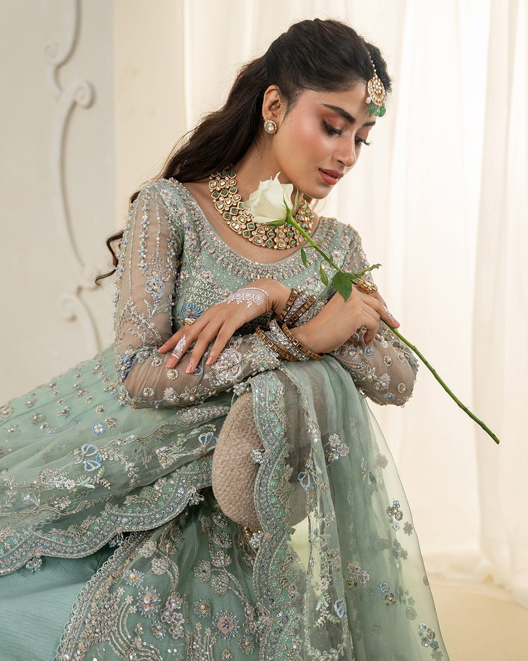 Faiza Saqlain Selin Hand Embellished Organza Party Wear Suit – Embroidery & Handwork Detail Faiza Saqlain Selin Hand Embellished Organza Party Wear Suit - Close-Up Hand Embellishment Tilla & Pearl Work | IQNAZ