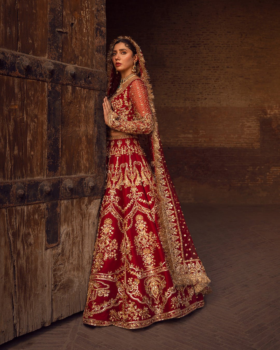 Faiza Saqlain Arusa Hand Embellished Raw Silk Bridal Lehenga – Back View & Silhouette Faiza Saqlain Arusa Hand Embellished Raw Silk Bridal Lehenga - Embroidered Back & Daman Silhouette Detailing | IQNAZ