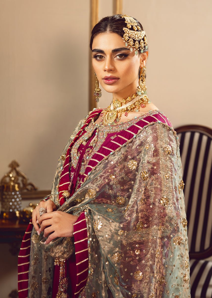 Sara Rohail Asghar Embroidered Silk Party Wear Suit – Dupatta & Border Detailing Sara Rohail Asghar Embroidered Silk Party Wear Suit - Four-Sided Embroidered Dupatta & Pallu Border | IQNAZ