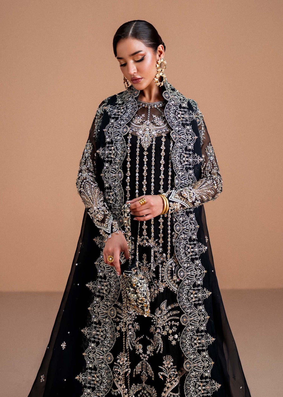 Kanwal Malik Rayen Hand Embellished Organza Party Wear Suit – Back View & Silhouette Kanwal Malik Rayen Hand Embellished Organza Party Wear Suit - Embroidered Back & Daman Silhouette Detailing | IQNAZ