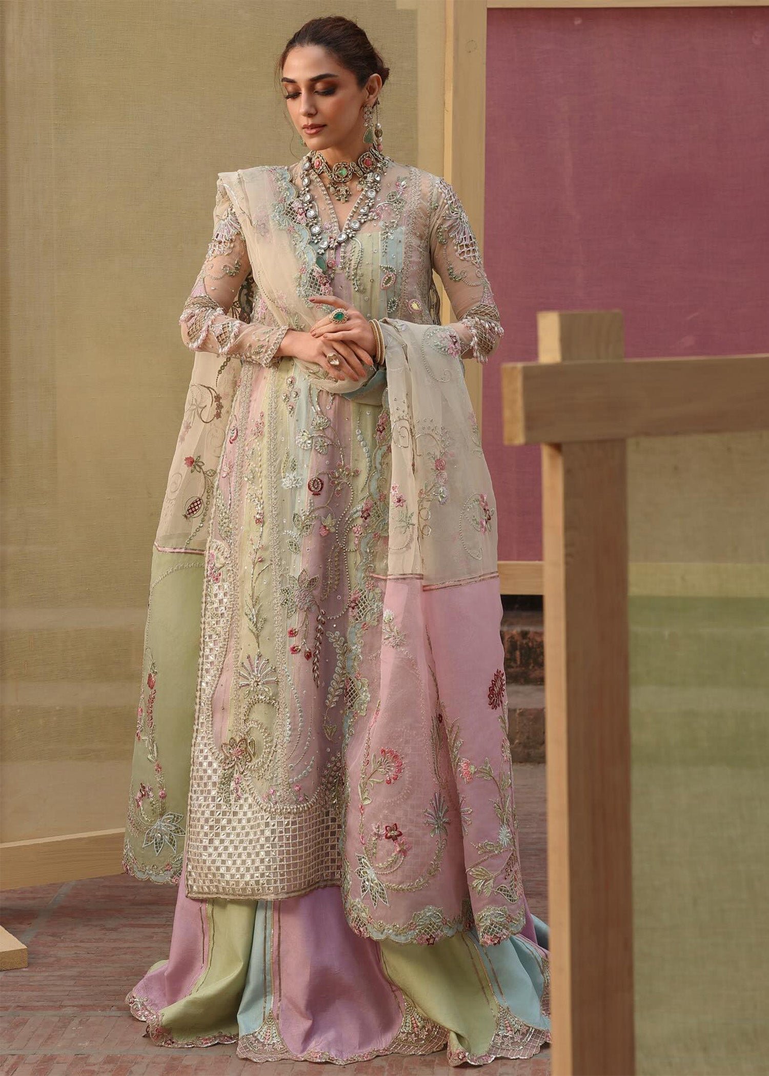 Crimson Rangoli Hand Embellished Raw Silk Bridal Lehenga – Model Front View Crimson Rangoli Hand Embellished Raw Silk Bridal Lehenga - Model Front Look | Pakistani Designer Replica Wholesale | IQNAZ