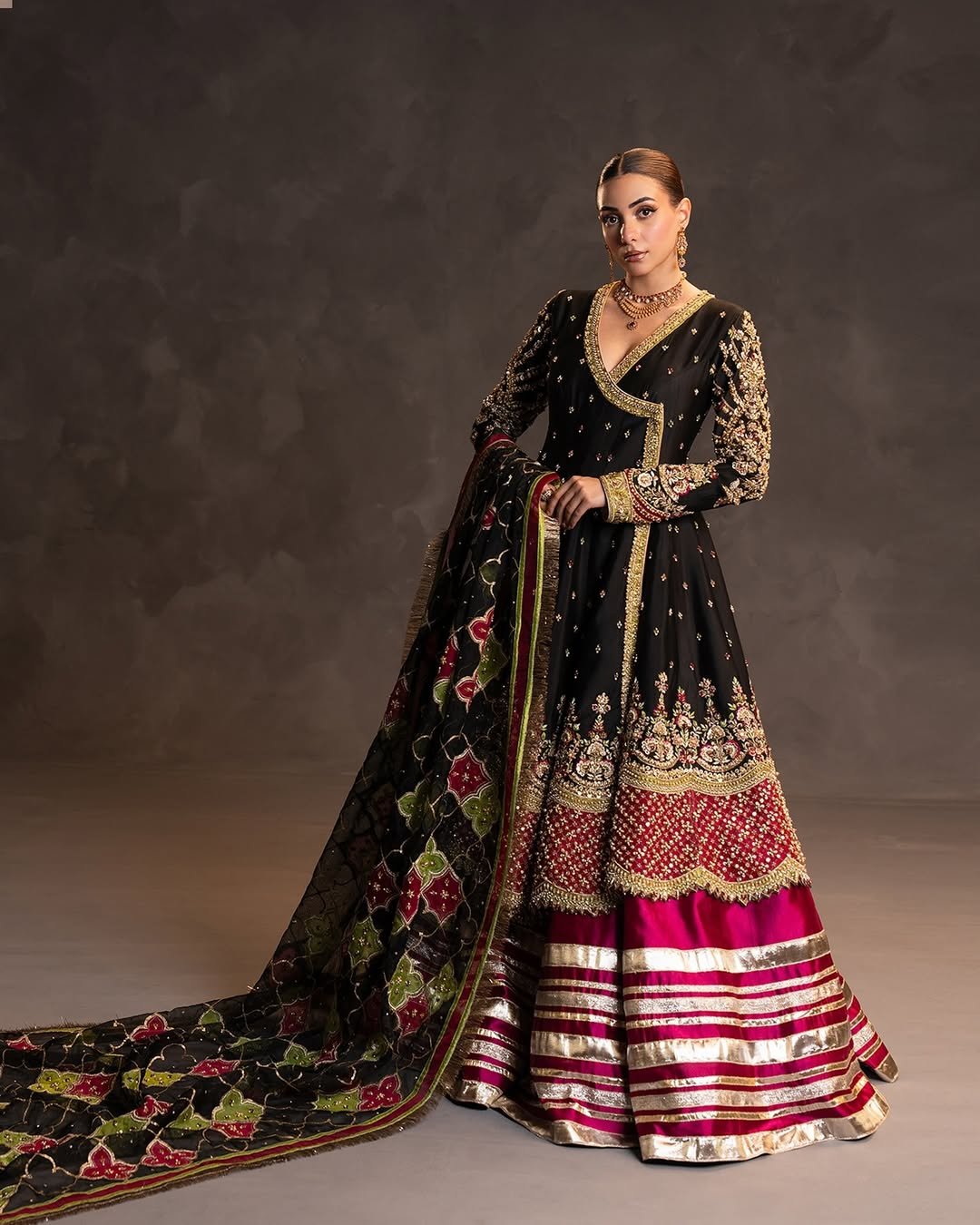 Ahmad Sultan Embroidered Organza Party Wear Suit – Model Front View Ahmad Sultan Embroidered Organza Party Wear Suit - Model Front Look | Pakistani Designer Replica Wholesale | IQNAZ