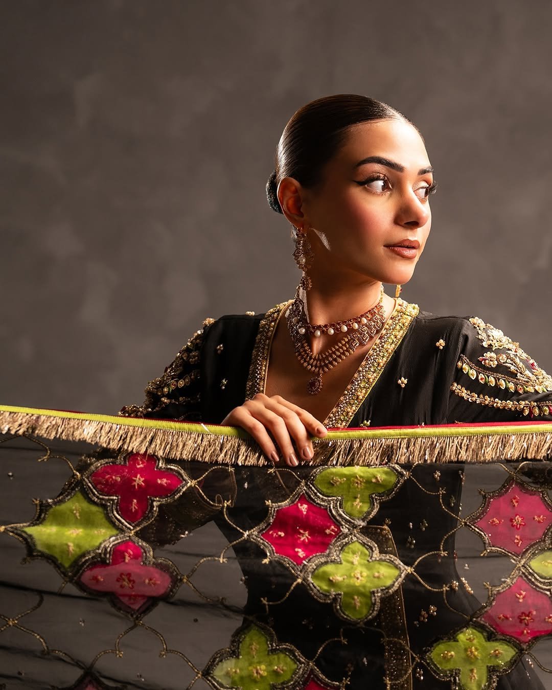 Ahmad Sultan Embroidered Organza Party Wear Suit – Embroidery & Handwork Detail Ahmad Sultan Embroidered Organza Party Wear Suit - Close-Up Hand Embellishment Tilla & Pearl Work | IQNAZ