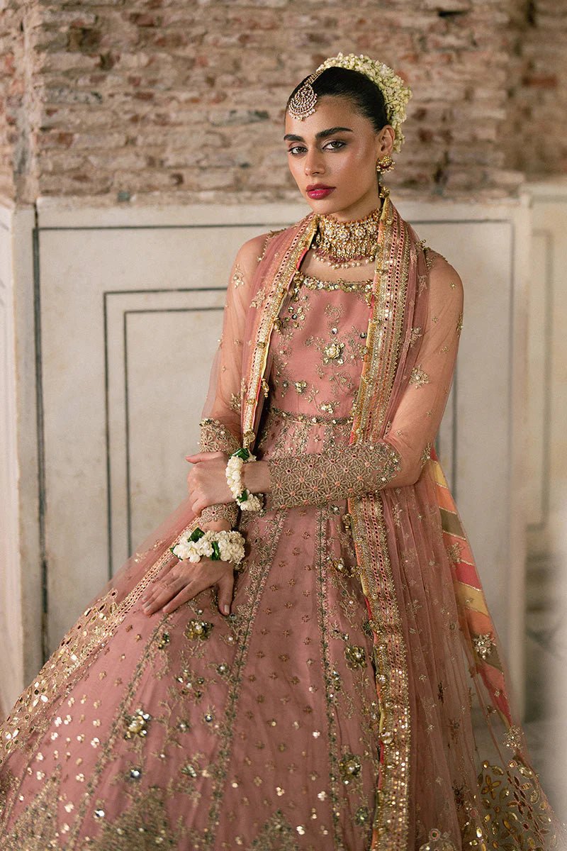 Mohsin Naveed Ranjha Hand Embellished Net Party Wear Suit – Embroidery & Handwork Detail Mohsin Naveed Ranjha Hand Embellished Net Party Wear Suit - Close-Up Hand Embellishment Tilla & Pearl Work | IQNAZ